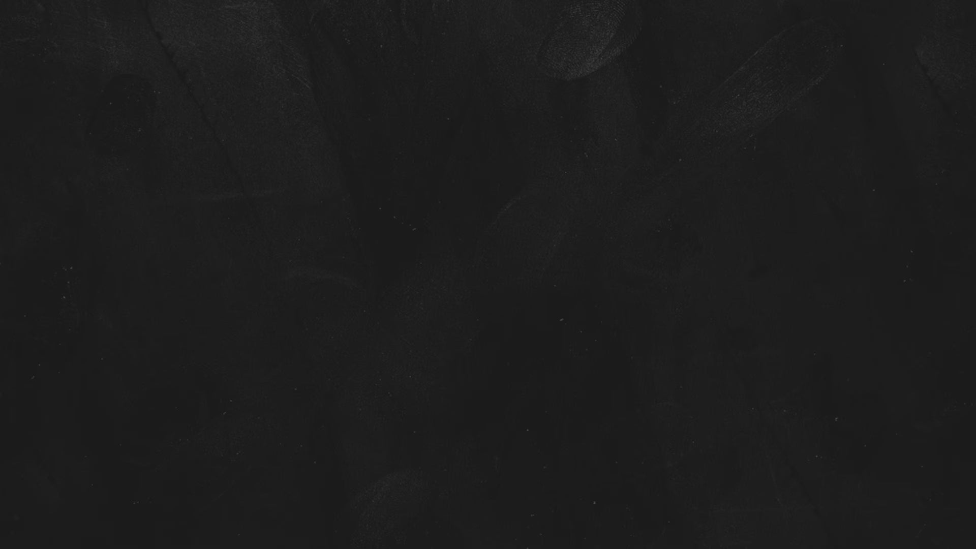 Black background scattered with barely visible grey handprints.